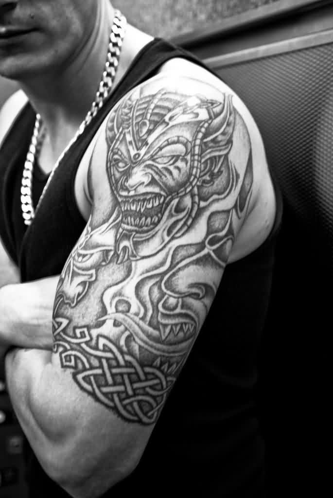 black and grey shoulder tattoos